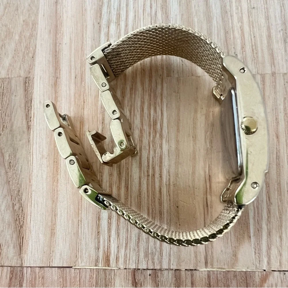 Kenneth Cole New York ladies rectangular gold tone dress watch NEW BATTERY